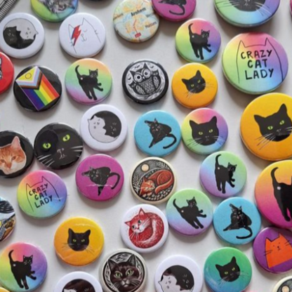 Button 'KattenKrent' regenboog.
